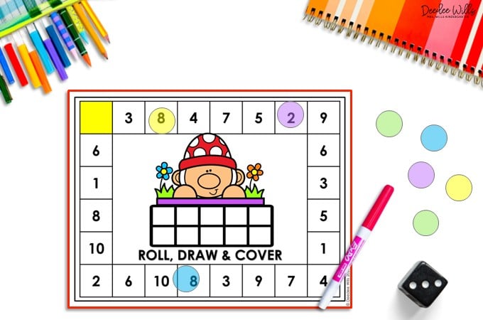 Roll and cover math game with a 10 frame